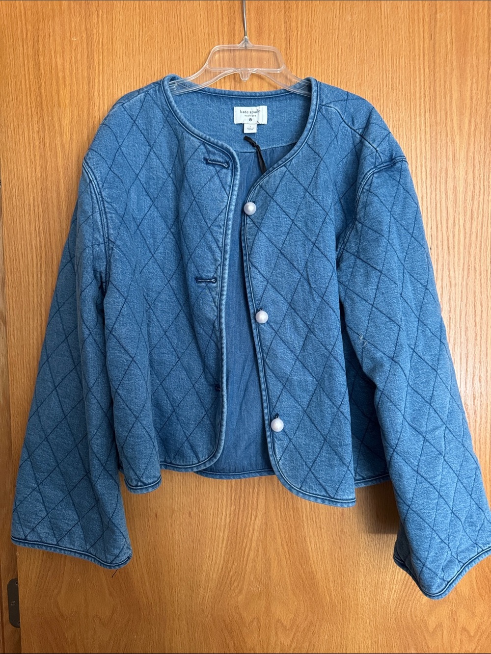 kate spade quilted denim jacket in blue with pearl buttons